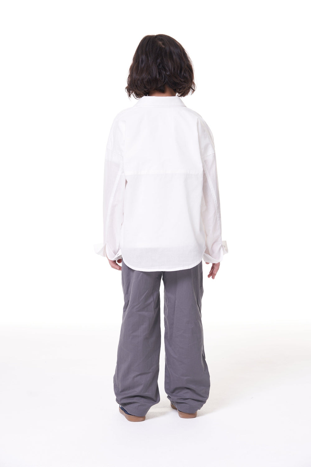 Back view of the ON7 Shirt in off white