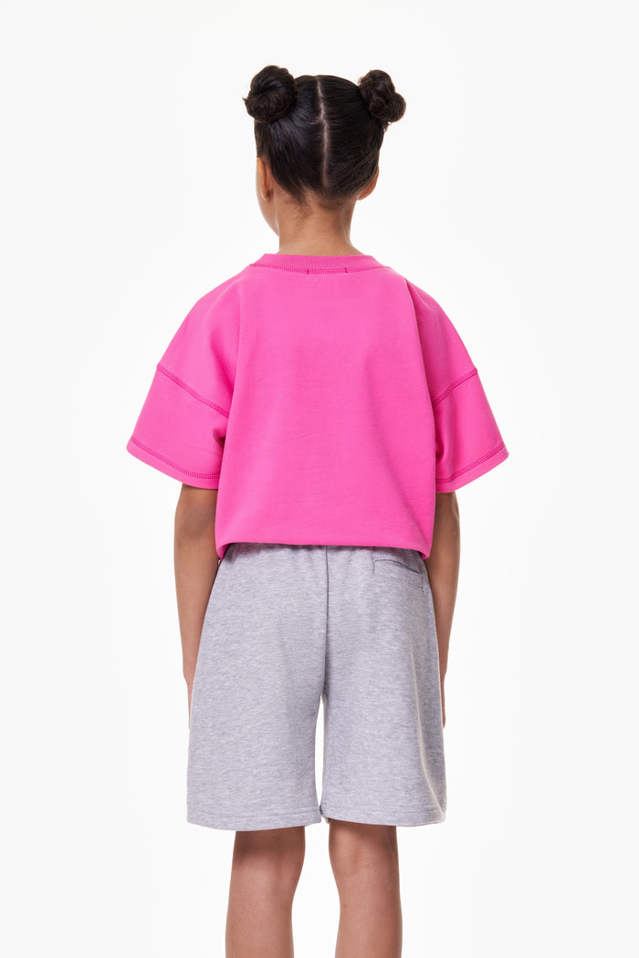 Girl wearing the ON7 Everyday Shorts in melange, view 2 of 5